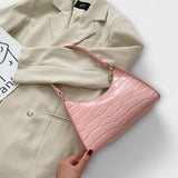 Cécile. - Lesklá kožená taška