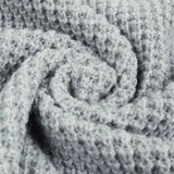 Růžový otevřený svetr