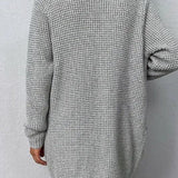 Růžový otevřený svetr