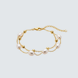 Stylový zlatý perlový náramek